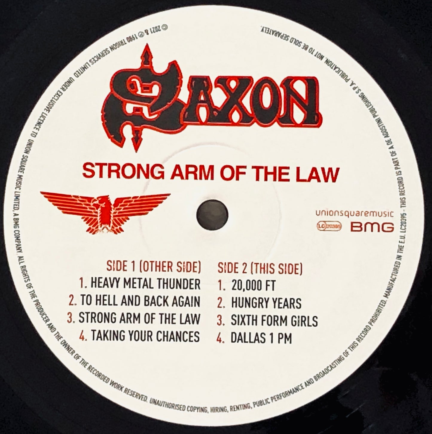 SAXON - Strong Arm of the Law - Vinile Rimasterizzato + Spilla e Toppa